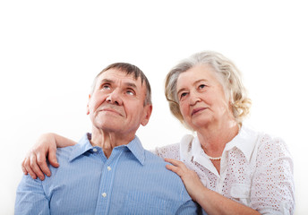 Closeup portrait of smiling elderly couple