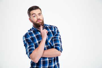 Portrait of a thoughtful man looking at camera