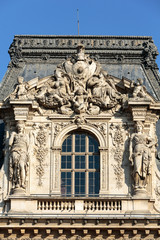 Fototapeta na wymiar Paris - Architectural fragments of Louvre building. Louvre Museum is one of the largest and most visited museums worldwide.