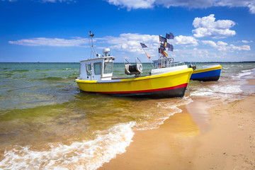Naklejka na ściany i meble Fishing boats on the beach of Baltic Sea in Poland
