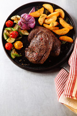 Tasty Beef Steak with Grilled Veggies on Skillet