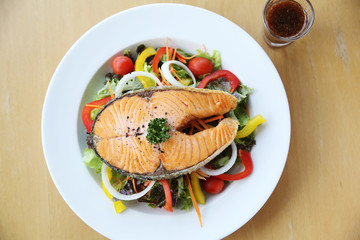 salmon steak with salad