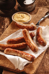 Smoked German sausages with mustard dip