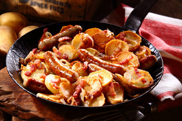 Crisp golden potato with frankfurters and bacon