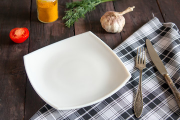 square white plate on a vintage table