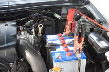 Charging battery car with electricity trough jumper cables