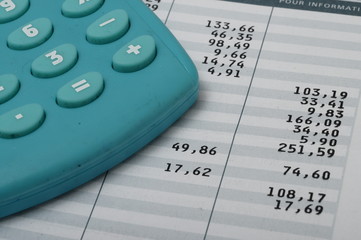 Close up of euro pay sheet and calculator