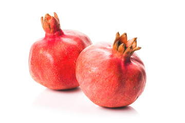 Two pomegranate. Isolated on white background