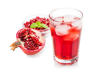 Pomegranate juice in a glass. Isolated on white background