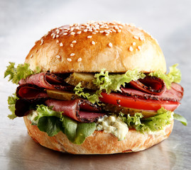 Roast beef or pastrami roll with salad trimmings