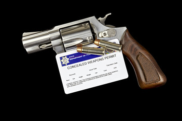 Revolver with Bullets and Concealed Weapon Permit