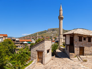 Fototapeta na wymiar View at the Old Town in Mostar with Minaret. Bosnia and Herzegovina.