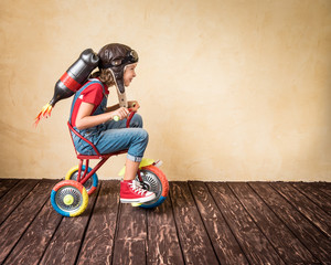 Kid playing with jet pack at home