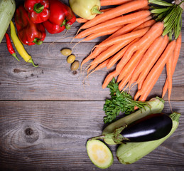 Vegetables on vintage wood background - autumn harvest. Rural st