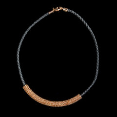 necklace on a black background
