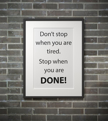 Inspirational motivating quote on picture frame.