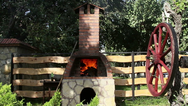 Baking bread in a traditional wood fired stone oven