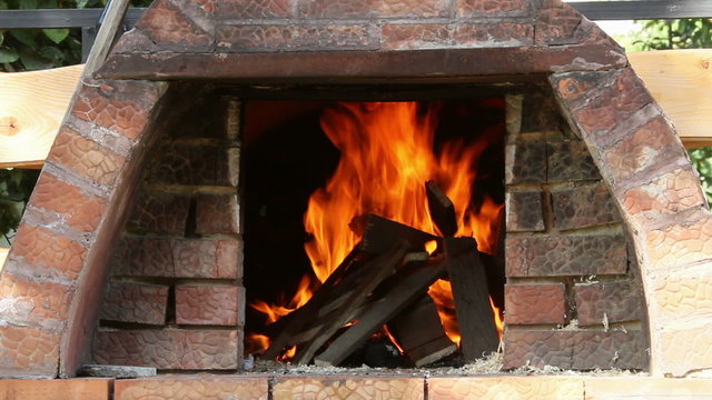 Wood fire in a traditional bread oven 