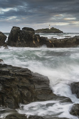 Beautiful sunrise landscape of Godrevy lighthouse on Cornwall co