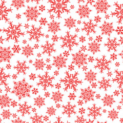 Seamless pattern of snowflakes, red on white