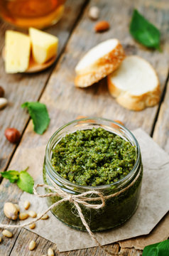Fototapeta Basil mint hazelnuts pistachios almonds pine nuts pesto