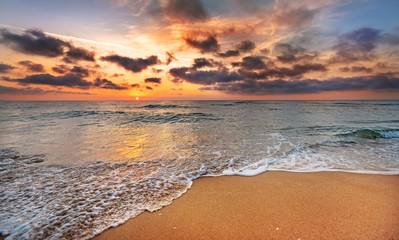 Sunrise on the beach of caribbean sea.