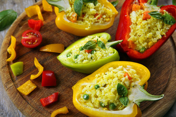 Stuffed peppers with vegetables on table close up