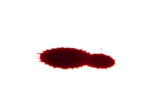 Blood dropping on white surface