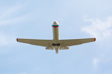 white plane takes off