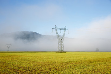 Big electricity high voltage pylon with power lines