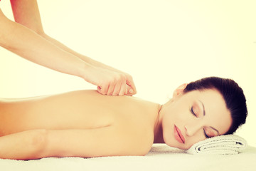 Woman getting massage in spa