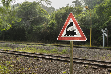 Train Tracks and Signpost at Iguazu Park in Argentina
