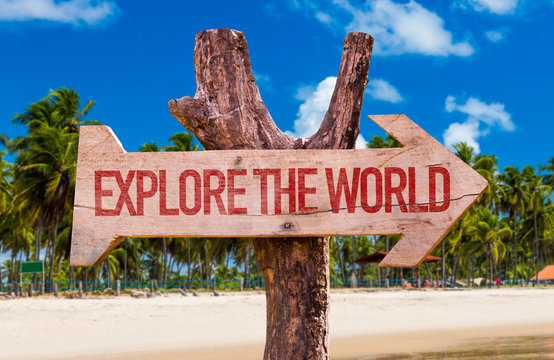 Explore the World arrow with beach background