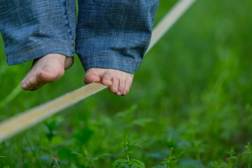 Slacklining in the summer park