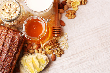 Healthy breakfast with bread, honey, nuts. Country breakfast concept
