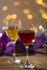 Wine and Christmas decoration on bright background