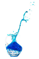 Crystal water jug with blue water splashing out on a white background