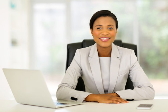 young afro american businesswoman relaxing in office