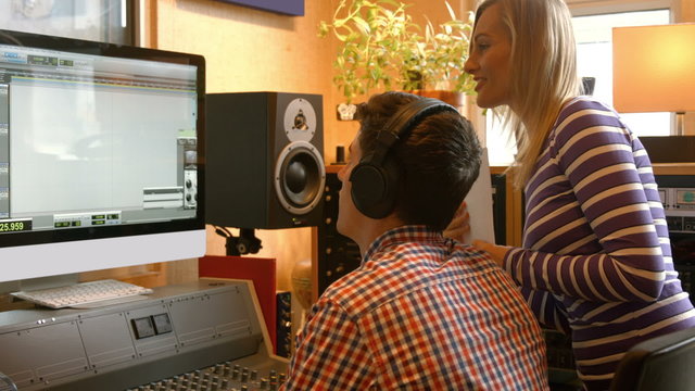 Students mixing music in the studio