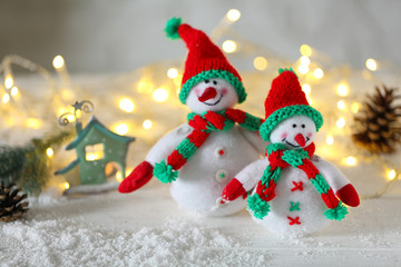 Cute snowmen on Christmas background