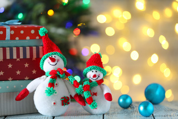 Cute snowmen on Christmas background