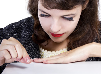 Retro style woman pretending to pick something up from surface for composites