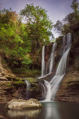 Obraz premium Waterfall and river in the forest
