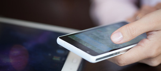 touch screen, close-up,  small depth of field, soft focus