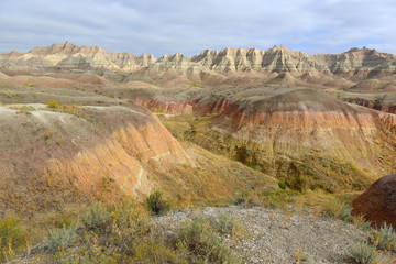 Badlands landscape, formed by deposition and erosion by wind and water, contains some of the richest fossil beds in the world, Badlands National Park, South Dakota, USA