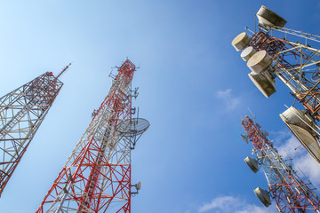 cellular communication towers on blue sky