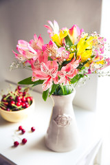 Alstroemeria flowers with cherries