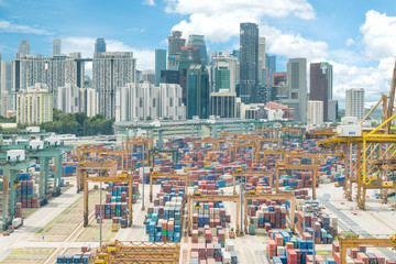 Aerial view of Singapore cargo container port and Singapore city