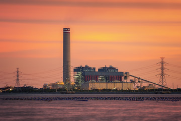 Power plant and natural petroleum gas refinery plant area at twilight