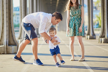 Happy family of three enjoying their vacation in Paris